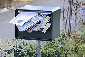 überfüllter Briefkasten,
 überfülltes Postfach